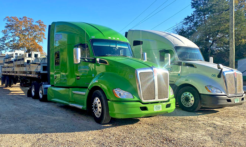 Two Kenworth trucks in our fleet of trucks at Lewis Transcontinental